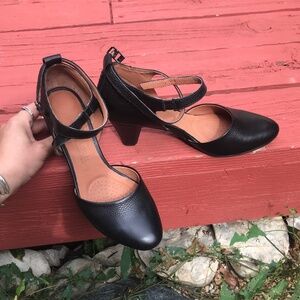 Black ankle wrap pumps
